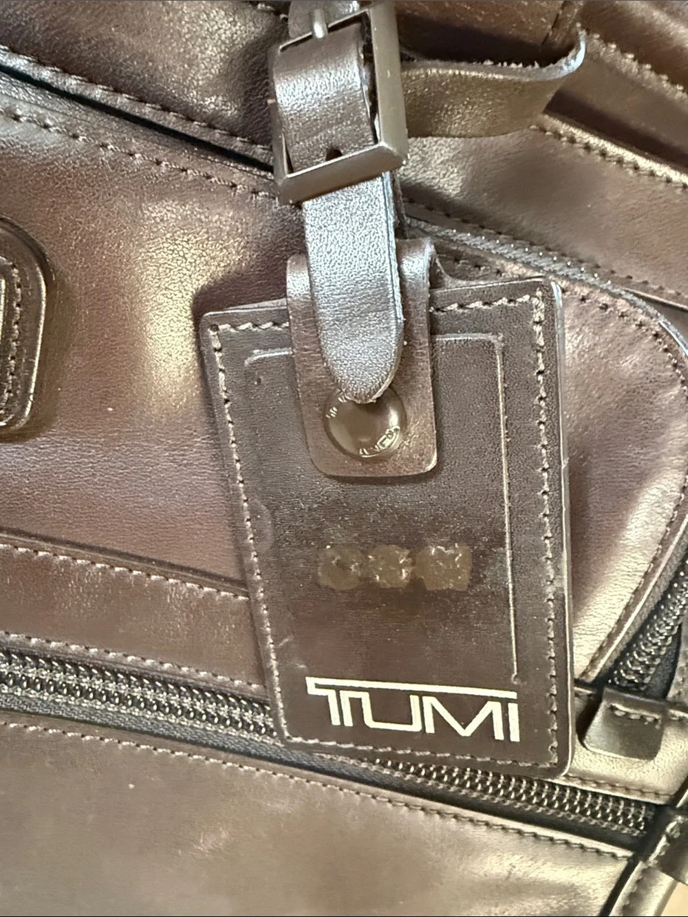 Tumi alpha leather